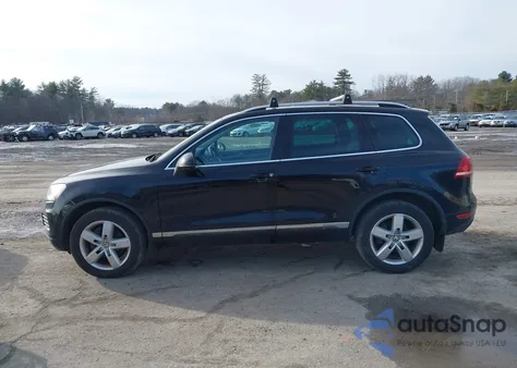 2014 Volkswagen Touareg 3.6L Lux z USA, uszkodzony, nr VIN WVGEF9BP9ED014722
